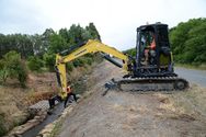 Digger installing instream features