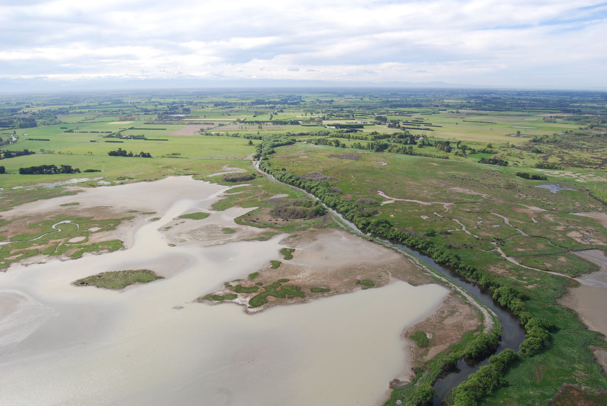 Ararira drone footage looking up from lagoon