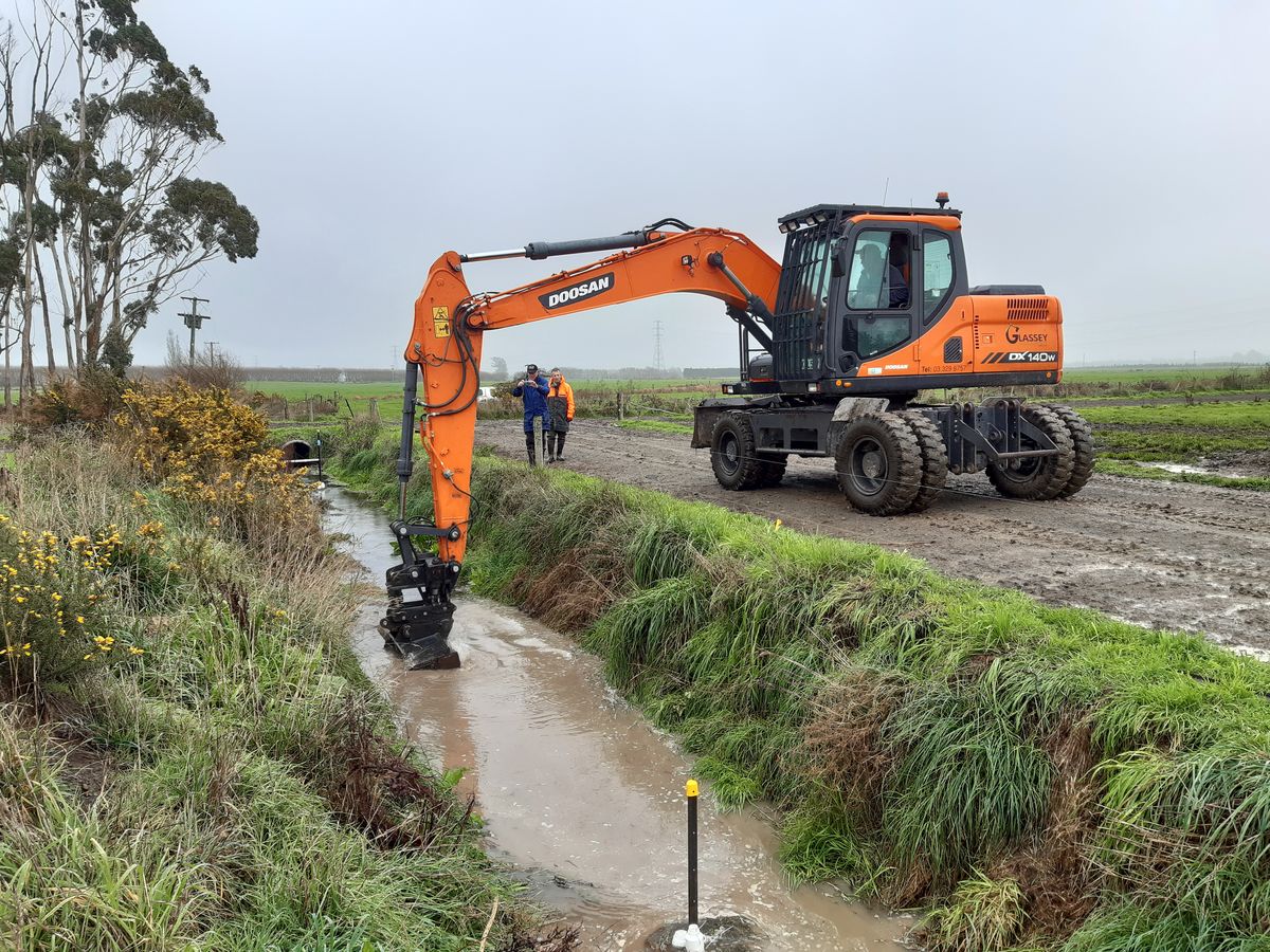 Digger in stream