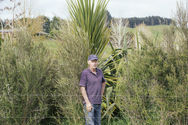 Graeme Gillet in front of fence off area