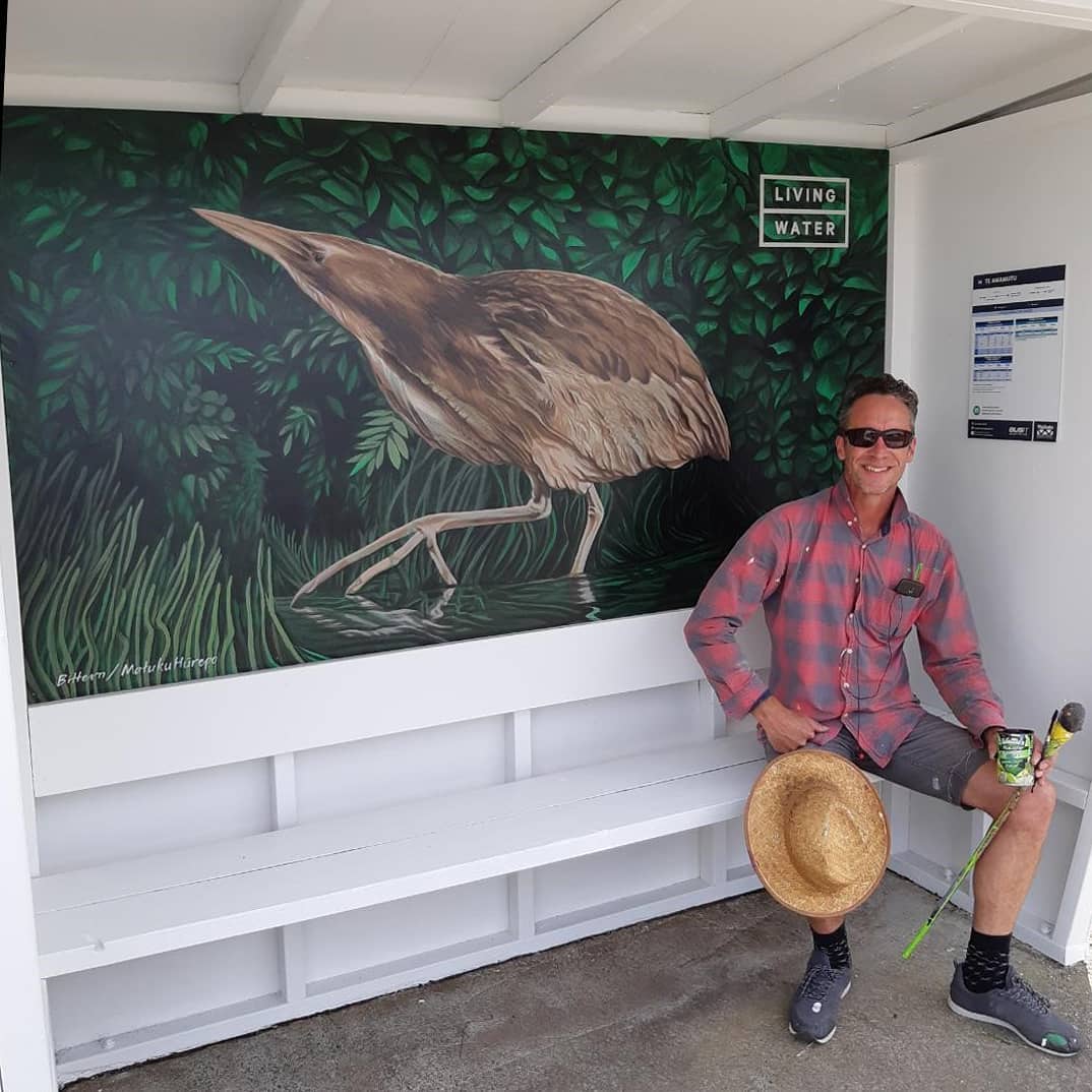 Artist, Jeremy Shirley with his Bittern mural